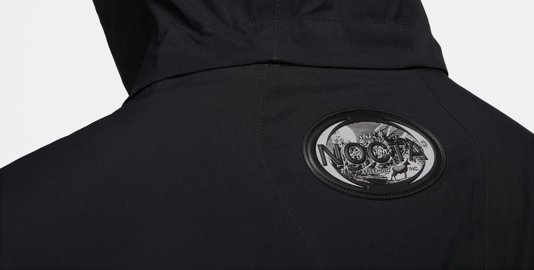Nike Nocta collection featuring premium jacket with Nocta logo patch